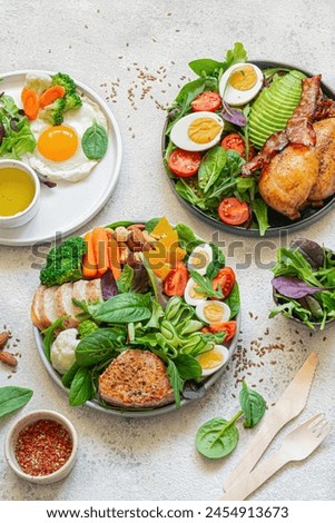 Similar – Image, Stock Photo Breakfast with egg, meat jamon, spinach and bread on terrace wooden table. Delicious homemade breakfast on balcony.