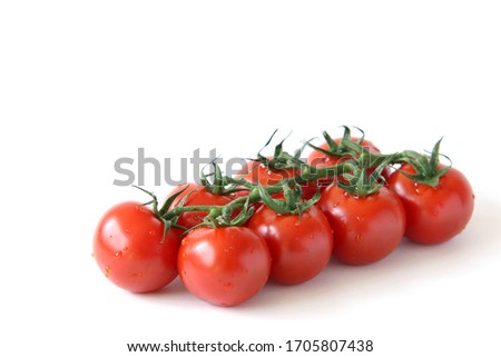 Image, Stock Photo Fresh panicles of tomatoes on a colourful plate