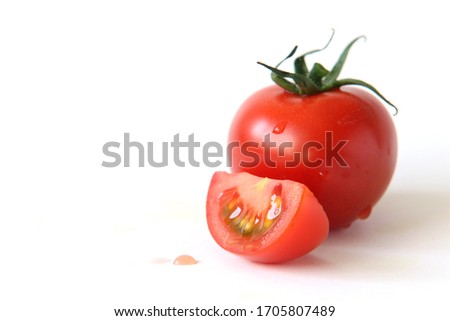 Similar – Image, Stock Photo Fresh panicles of tomatoes on a colourful plate