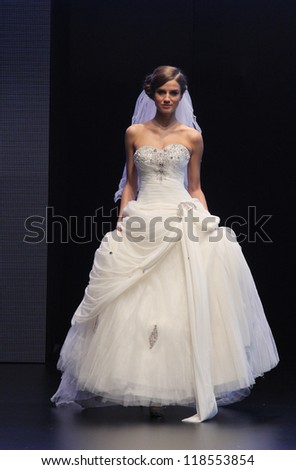 ZAGREB, CROATIA - OCTOBER 27: Fashion model wears wedding dress made by In Atelier Hera on \'Wedding days\' show, October 27, 2012 in Zagreb, Croatia.