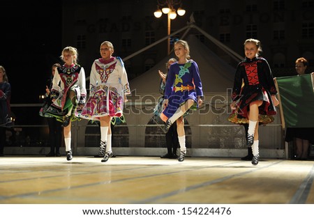 ZAGREB,CROATIA - JULY 18: Members of folk groups O'Shea-Ryan Irish Dancers from Australia during the 47th International Folklore Festival in center of Zagreb,Croatia on July 18,2013