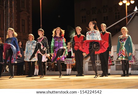 ZAGREB,CROATIA - JULY 18: Members of folk groups O\'Shea-Ryan Irish Dancers from Australia during the 47th International Folklore Festival in center of Zagreb,Croatia on July 18,2013