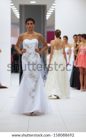 ZAGREB, CROATIA - OCTOBER 12: Fashion model in wedding dress made by Ana Milani on \'Wedding Expo\' show in the Westgate Shopping City in Zagreb, Croatia on October 12, 2013