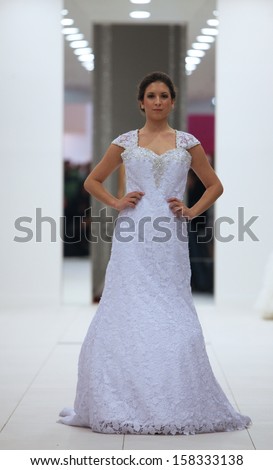 ZAGREB, CROATIA - OCTOBER 12: Fashion model in wedding dress on \'Wedding Expo\' show in the Westgate Shopping City in Zagreb, Croatia on October 12, 2013