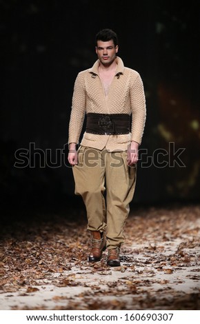 ZAGREB, CROATIA - OCTOBER 26: Fashion model wearing clothes designed by Boris Pavlin on the Cro a Porter show on October 26, 2013 in Zagreb, Croatia.