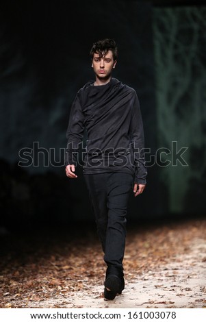 ZAGREB, CROATIA - OCTOBER 25: Fashion model wearing clothes designed by Spirir By T.B. on the Cro a Porter show on October 25, 2013 in Zagreb, Croatia.