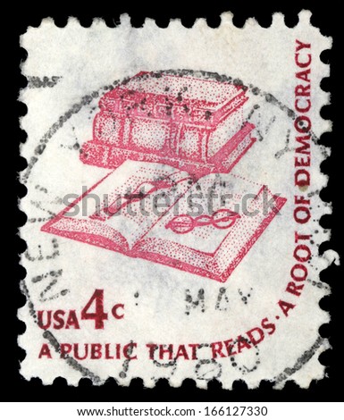 UNITED STATES - CIRCA 1975:Stamp printed in United states (USA), shows a book,bookmarks and glasses,with inscription A public that Reads a root of democracy, from the series Americana issue circa 1975