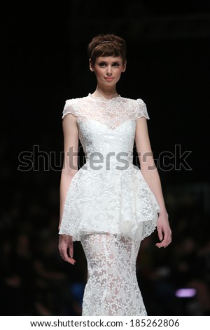 ZAGREB, CROATIA - MARCH 29: Fashion model wearing clothes designed by Envy Room on the \'Fashion.hr\' show on March 29, 2014 in Zagreb, Croatia.