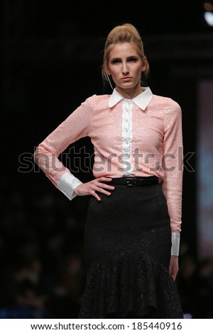 ZAGREB, CROATIA - MARCH 29: Fashion model wearing clothes designed by Envy Room on the \'Fashion.hr\' show on March 29, 2014 in Zagreb, Croatia.