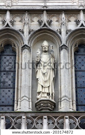 PARIS, FRANCE - NOV 11, 2012: Statue of Saint. Church of St-Germain-l\'Auxerrois founded in the 7th century, was rebuilt many times over several centuries.
