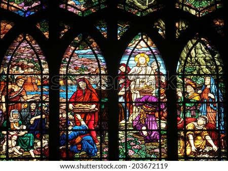 PARIS, FRANCE - NOV 09,2012:Feeding 5000 men and their families, stained glass.Church of Saint-Jean-de-Montmartre situated at the foot of Montmartre.Built from 1894 through 1904, Nov 09, 2012 in Paris