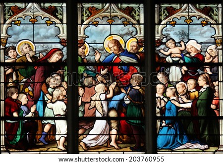 PARIS, FRANCE - NOV 11, 2012: Jesus Friend of Little Children, stained glass.The Church of St Severin is Catholic church in the Latin Quarter. It is one of the oldest churches on the Left Bank.