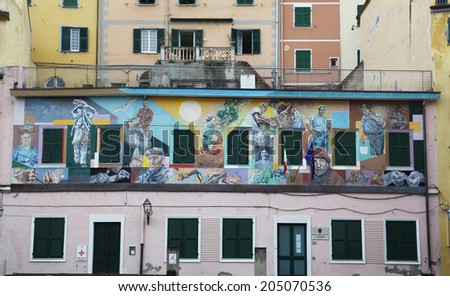 RIOMAGGIORE, ITALY - MAY 02: one of the Cinque Terre villages, UNESCO World Heritage Sites, Murals of the painter Silvio Benedetto, on May 02, 2014