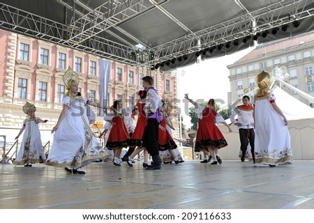 ZAGREB, CROATIA - JULY 16: Members of folk group Moscow, Russia during the 48th International Folklore Festival in center of Zagreb, Croatia on July 16, 2014