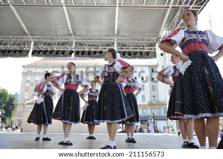 ZAGREB, CROATIA - JULY 18: Members of folk group Detva from Slovakia during the 48th International Folklore Festival in center of Zagreb,Croatia on July 18, 2014