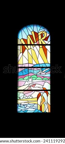 MEDUGORJE, BOSNIA AND HERZEGOVINA - FEBRUARY 19: Peace, stained glass church window in the parish church of St. James in Medugorje on February 19, 2011.