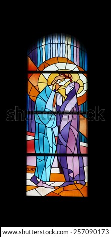 MEDUGORJE, BOSNIA AND HERZEGOVINA - FEBRUARY 19: Stained glass church window in the parish church of St. James in Medugorje on February 19, 2011.