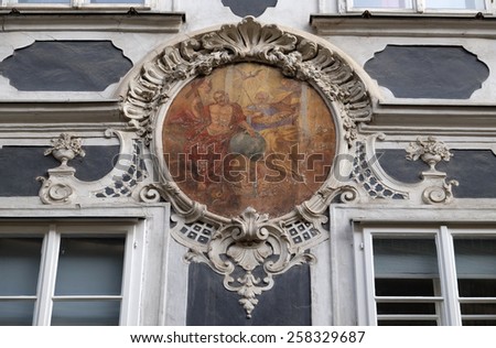 GRAZ, AUSTRIA - JANUARY 10, 2015: Holy Trinity fresco painting on the house facade in Graz, Styria, Austria on January 10, 2015.