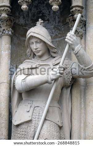ZAGREB, CROATIA - APRIL 04: Statue of Saint George on the portal of the cathedral dedicated to the Assumption of Mary and to kings Saint Stephen and Saint Ladislaus in Zagreb on April 04, 2015