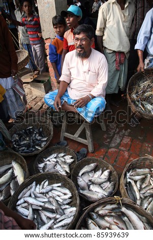 KUMROKHALI, INDIA - JANUARY 12: Selling fish on fish market in Kumrokhali, West Bengal, India on January 12, 2009. Seafood is one of the main source of food for local people.