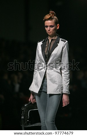 ZAGREB, CROATIA - MARCH 15: Fashion model wears clothes made by AMDS by Alduk on \