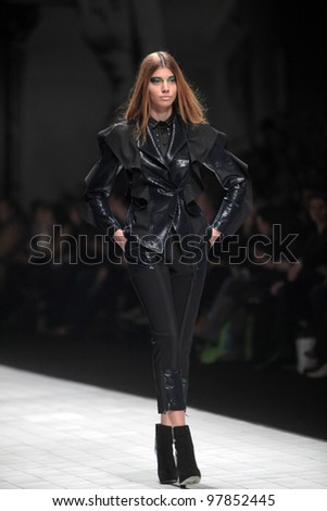 ZAGREB, CROATIA - MARCH 16: Fashion model wears clothes made by Ana Maria Ricov on \