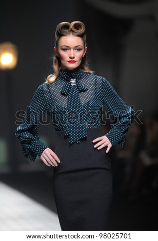 ZAGREB, CROATIA - MARCH 17: Fashion model wears clothes made by Ivica Skoko on 