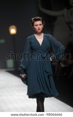 ZAGREB, CROATIA - MARCH 17: Fashion model wears clothes made by Ivica Skoko on \