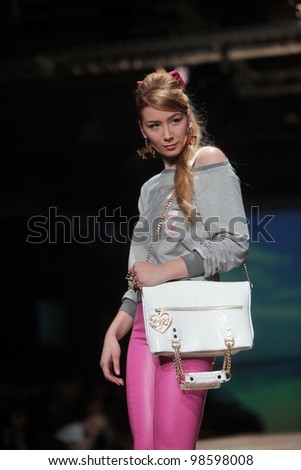 ZAGREB, CROATIA - MARCH 23: Fashion model wears clothes made by ELFS on \