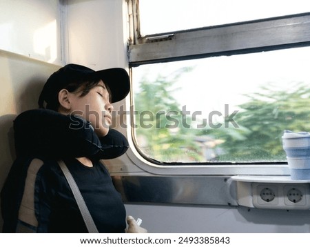 Similar – Image, Stock Photo Tired female traveler sleeping on airport.