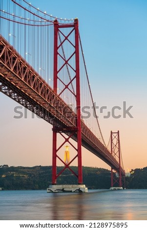 Similar – Foto Bild Rote Brücke mit einem langen Holzweg und einem Wolkenhimmel