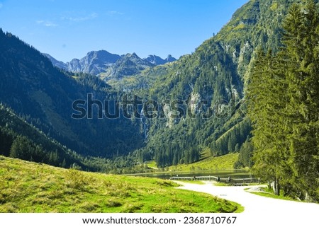 Similar – Foto Bild Der steirische Bodensee mit Bergen und deren Spiegelung