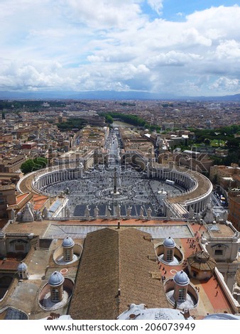 ROME - MAY 4: St. Peter\'s Square view from St. Peter\'s Basilica roof on May 4, 2014 in Rome. St. Peter\'s Square (Piazza San Pietro) is a massive plaza in the Vatican City, the papal enclave.