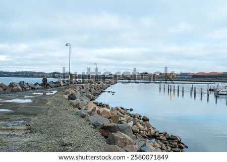 Similar – Foto Bild Ruhiger Tag an dänischem Nordseestrand