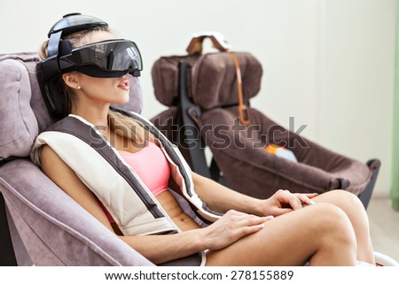 Woman resting with massage glasses