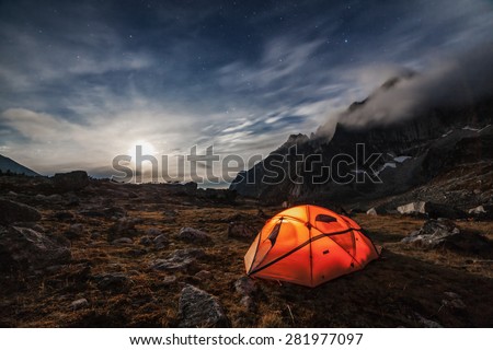 Camping in the mountains. Moon night