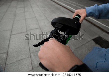 Similar – Image, Stock Photo Activating electric scooter from smartphone