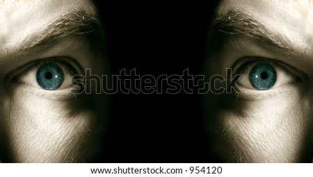 Close up of mans eye on black background