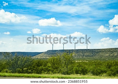 Similar – Image, Stock Photo Wind turbines with fluffy clouds