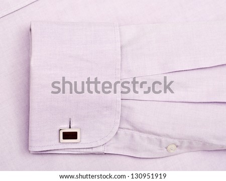 Pink shirt and sleeve with a cuff link