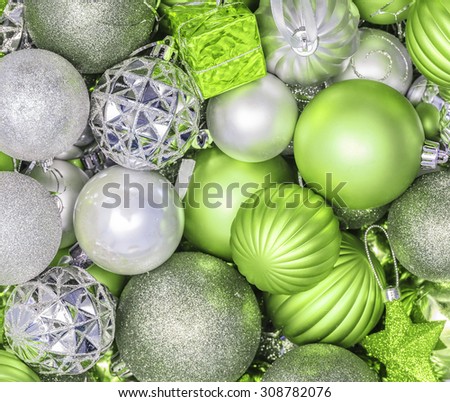 Background from Christmas decorations, spheres in lime, green color scale