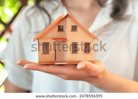 Similar – Image, Stock Photo Small houses in the big city