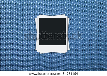 blank photos on blue wicker background