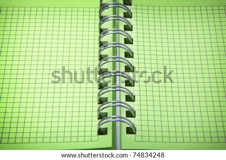 close up shot of green notebook with focus set in center