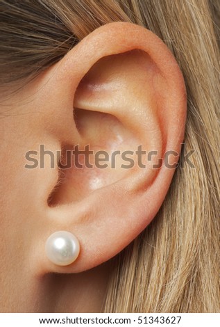 The ear of a young woman