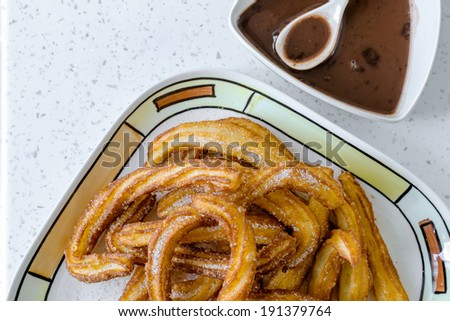 Typical Spanish fried pastry for dessert - churros