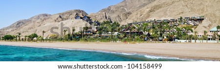 Panoramic view on southern beach of Eilat - famous resort city on the Red Sea, Israel