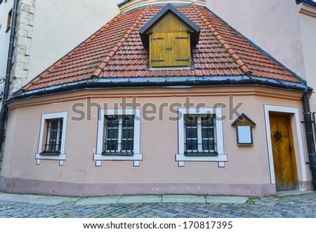 RIGA, LATVIA - SEPTEMBER 22, 2013: Medieval house of Inn in old Riga city. Riga is  capital and largest city of Latvia, major commercial, cultural, historical and financial center of Baltic region