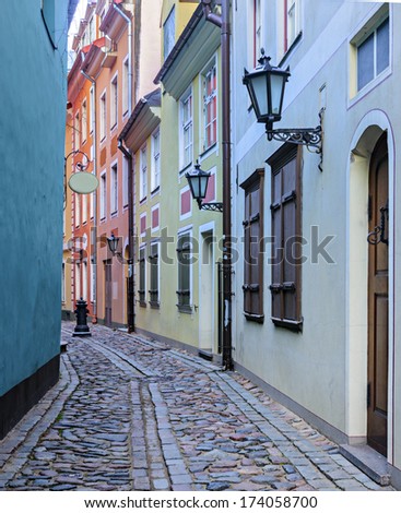 Narrow medieval street in the old Riga city. In 2014, Riga is the European capital of culture