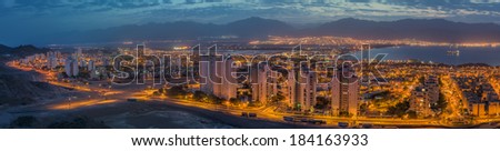 Spectacular panoramic view on the Red Sea and Eilat city. Eilat is a famous resort Israeli city with beautiful beaches, resort hotels and numerous spots of water sport, entertainments and shopping.